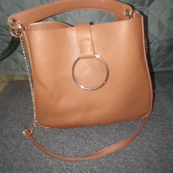Tan faux leather bag.